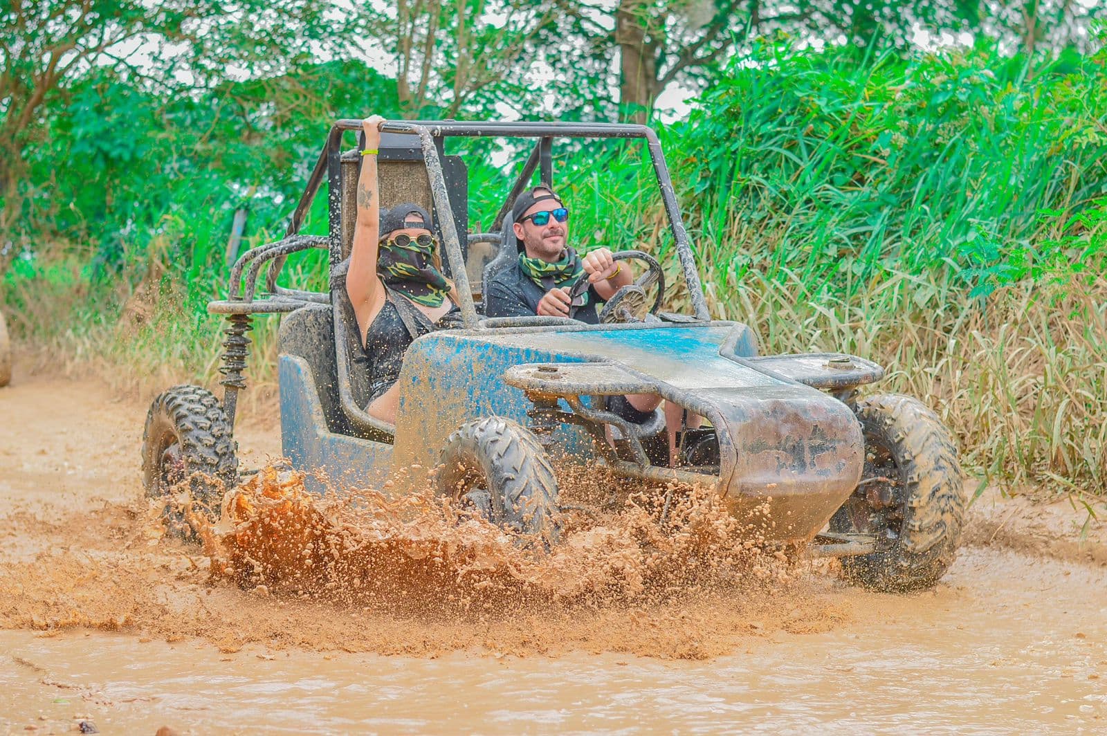 Buggy adventure splashing through muddy water