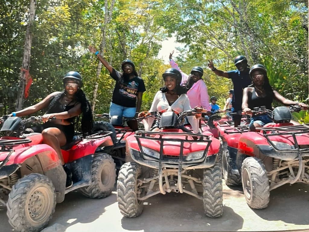 Friends enjoying a private group ATV experience in Punta Cana